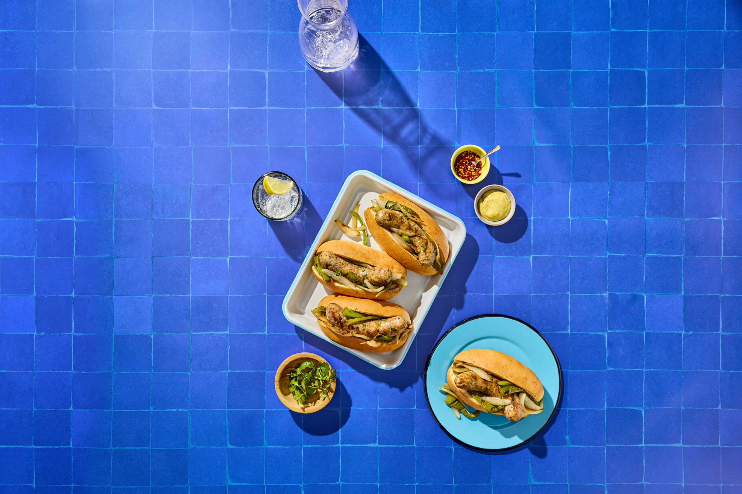 Grilled Sausage Grinder with Onions and Peppers​